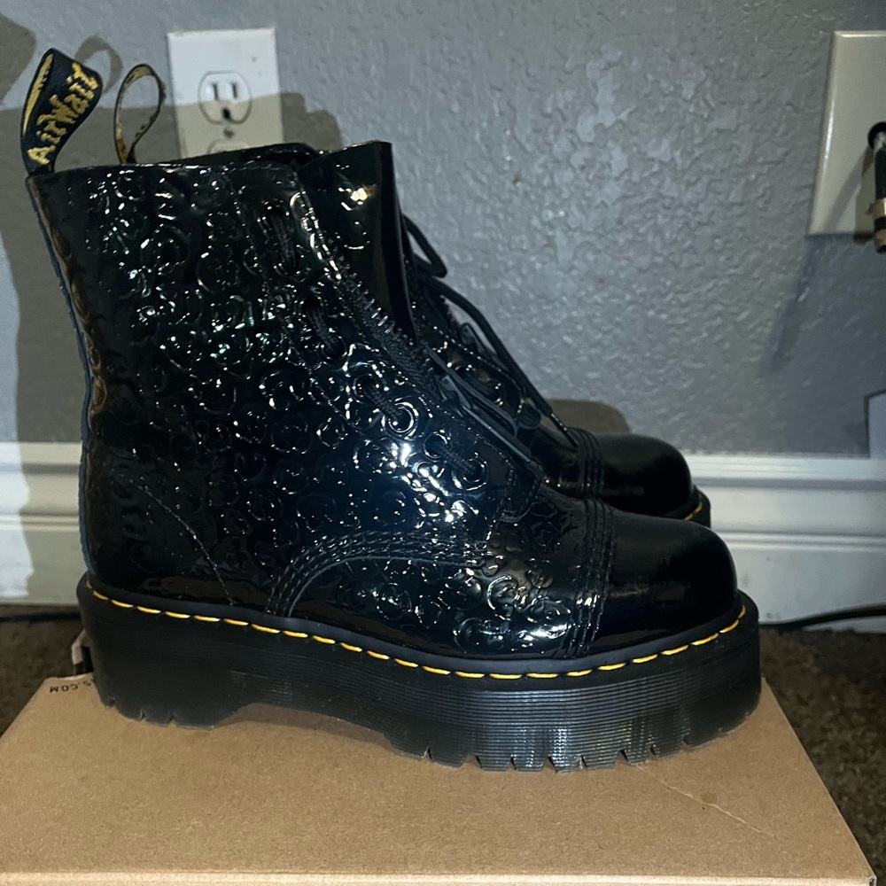 Black Cheetah Print Embossed Dr. Martens
